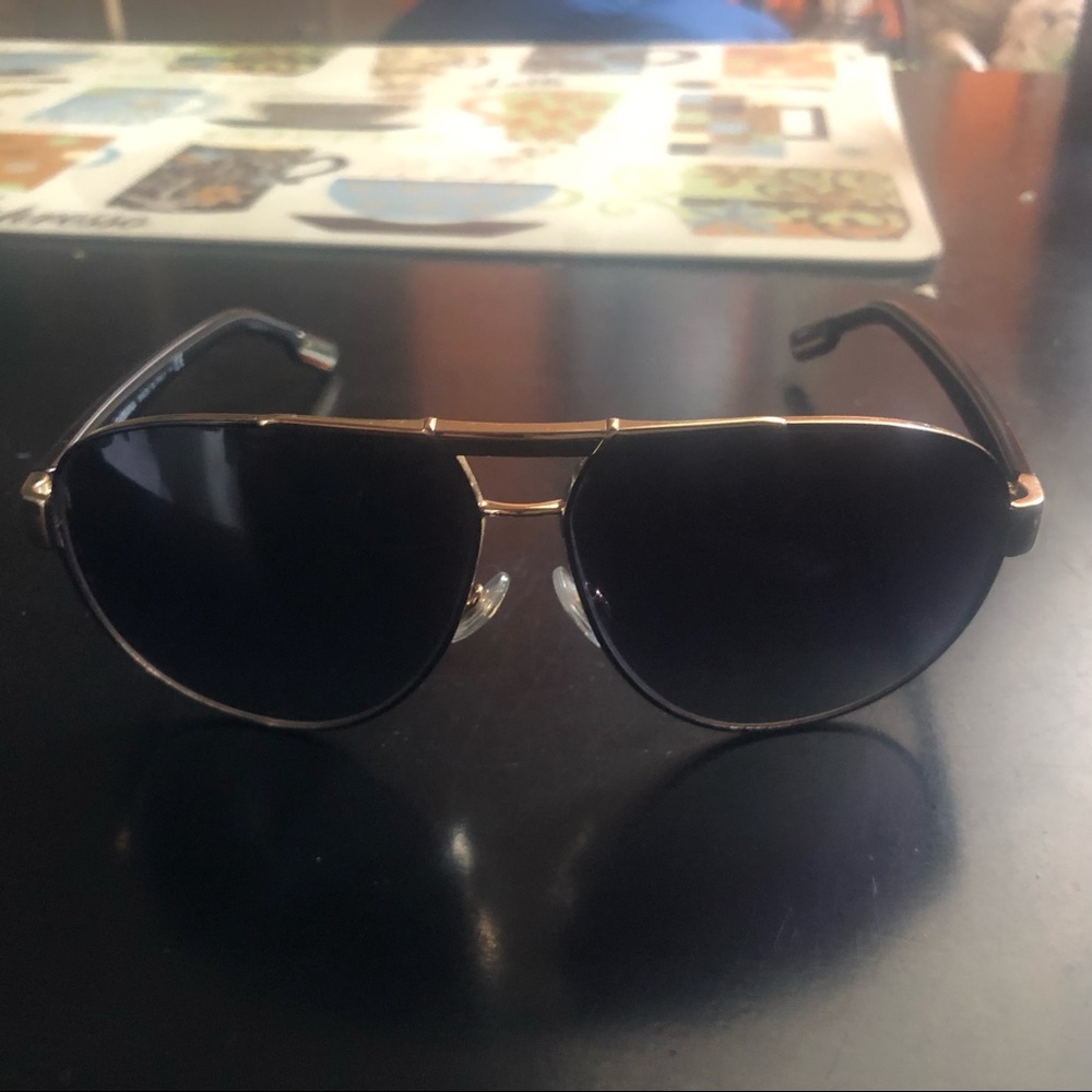 Dolce and Gabbana sun glasses